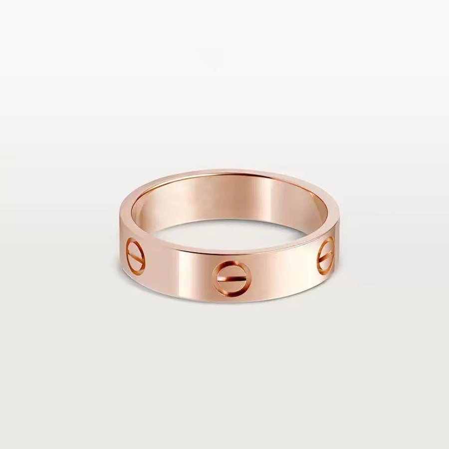 Pierścionek rose gold z okrągłymi detalami